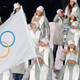 A volunteer carries the flag of the Olympic Athletes from Russia.